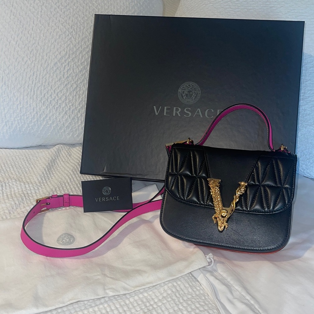 Versace crossbody/handbag. Pink handle